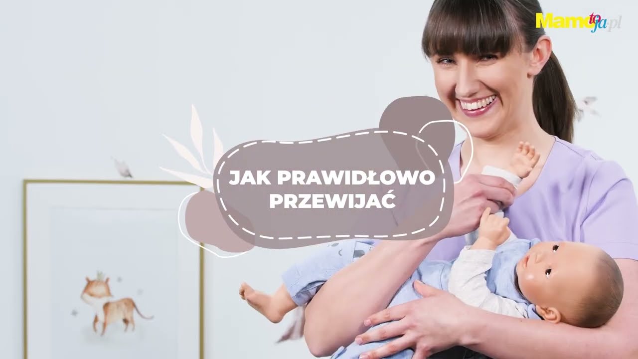 jak.prawidłowo trzymać dziecko podczas przeniwtajia pieluchy