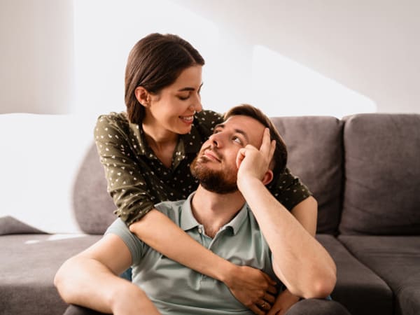 girl pampering a boy